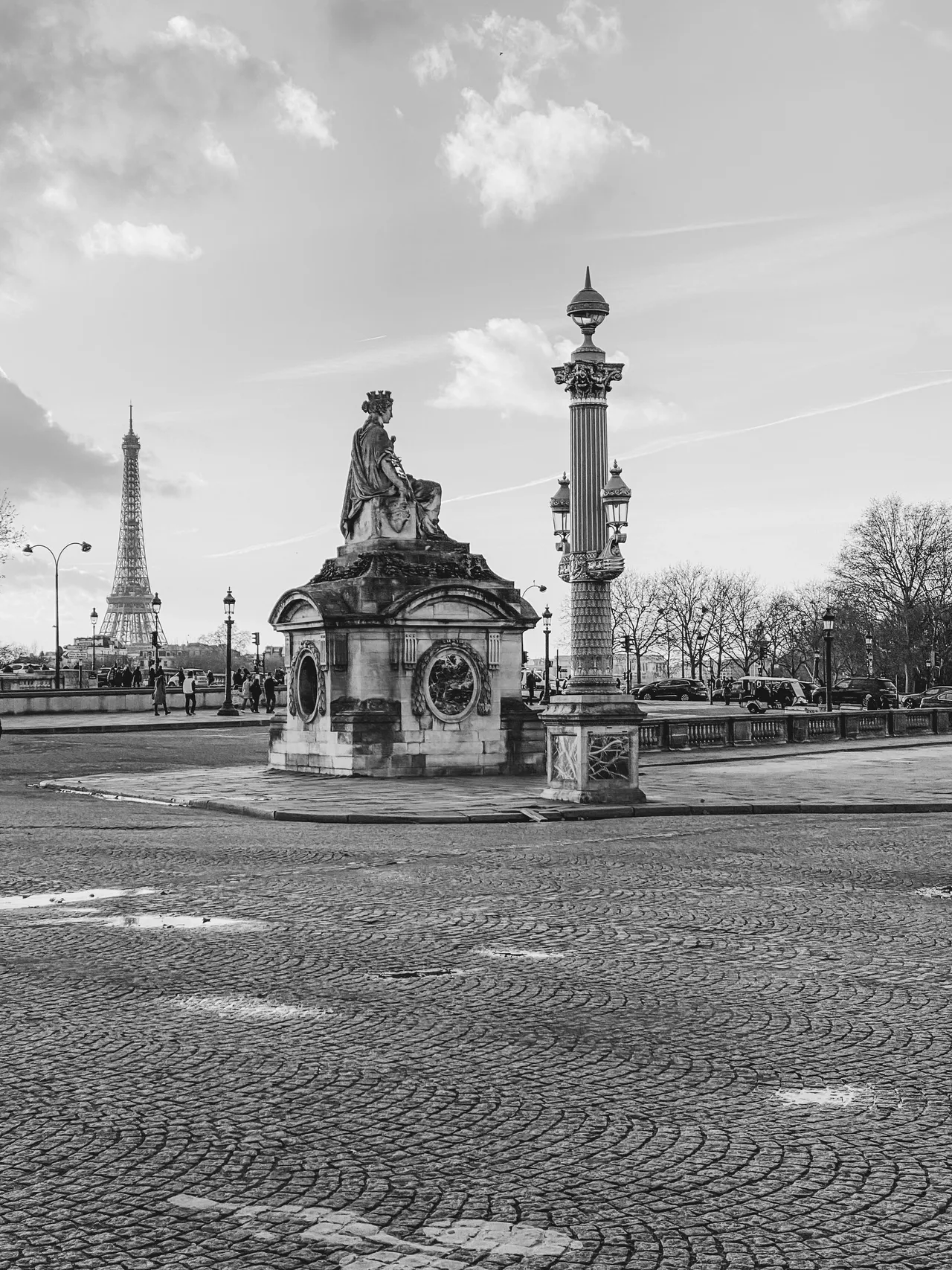 Historic monument with Eiffel Tower background.