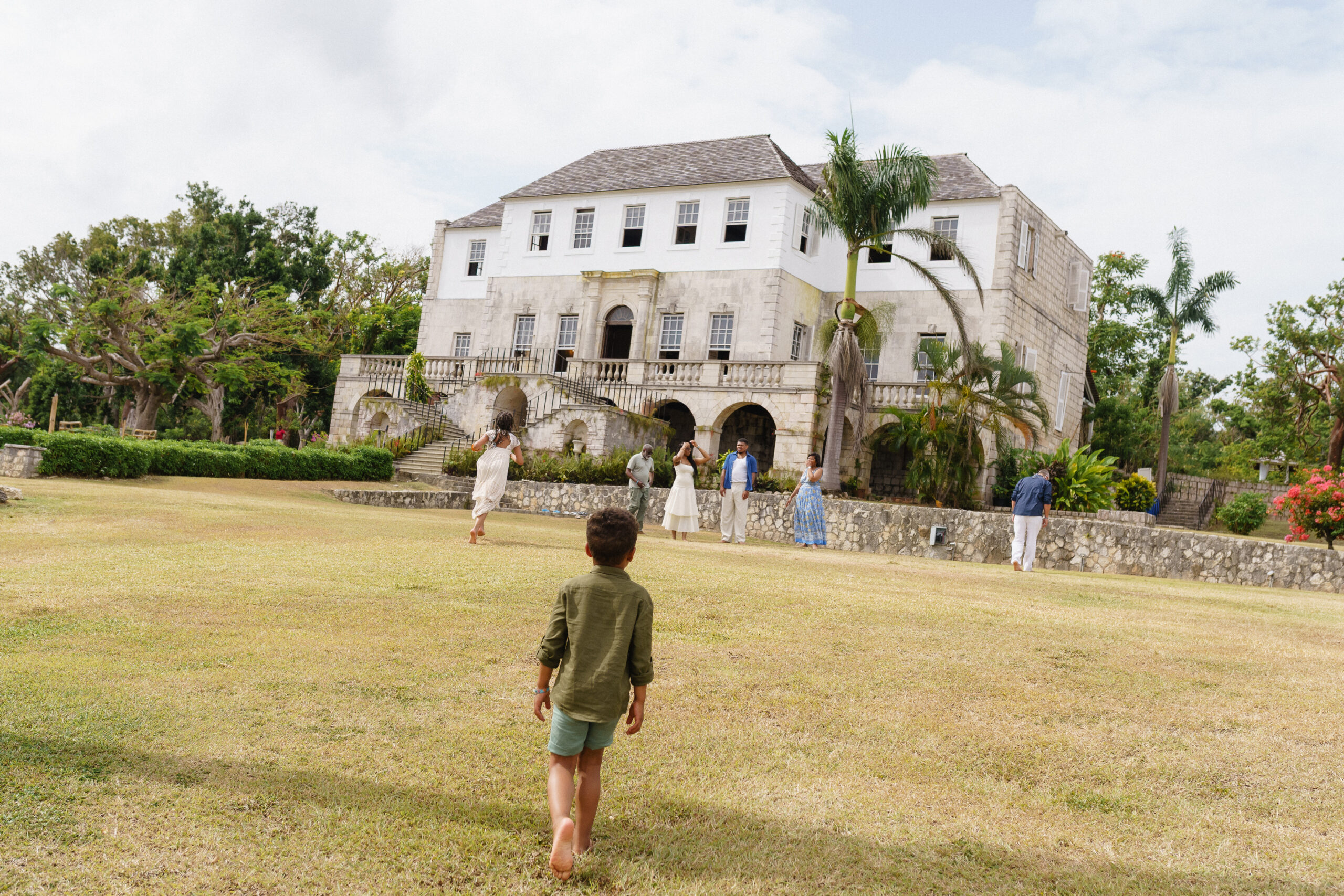 Children running next to Rose Hall in Montego Bay