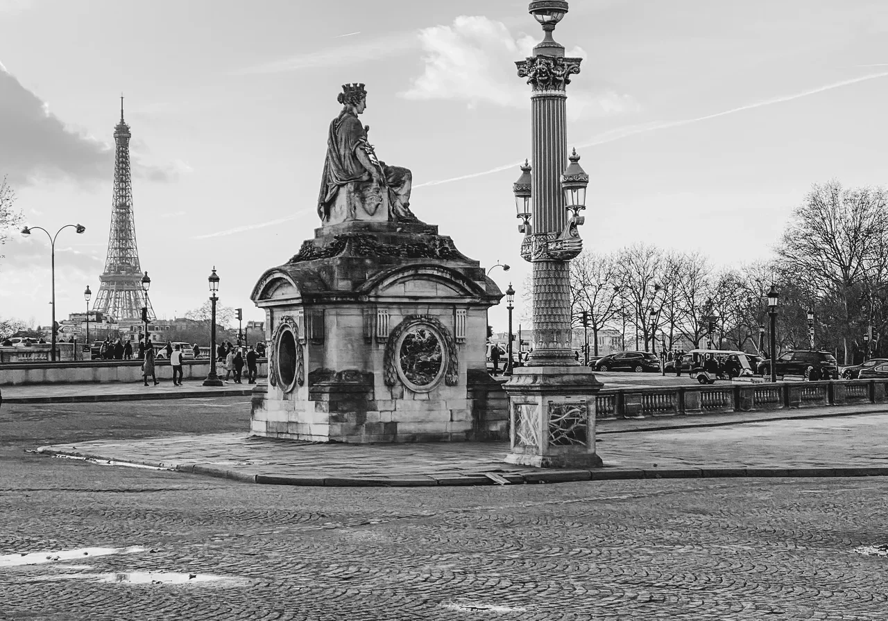 Historic monument with Eiffel Tower background.